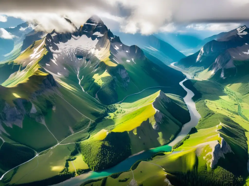 Vista aérea de montañas nevadas, valles verdes y ríos